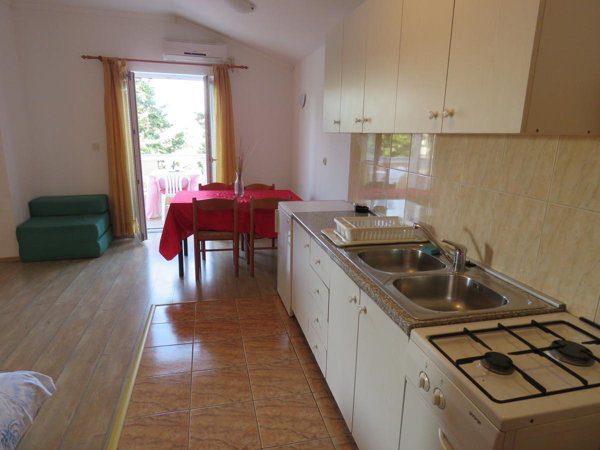 Apartments Palma Novalja Rom bilde